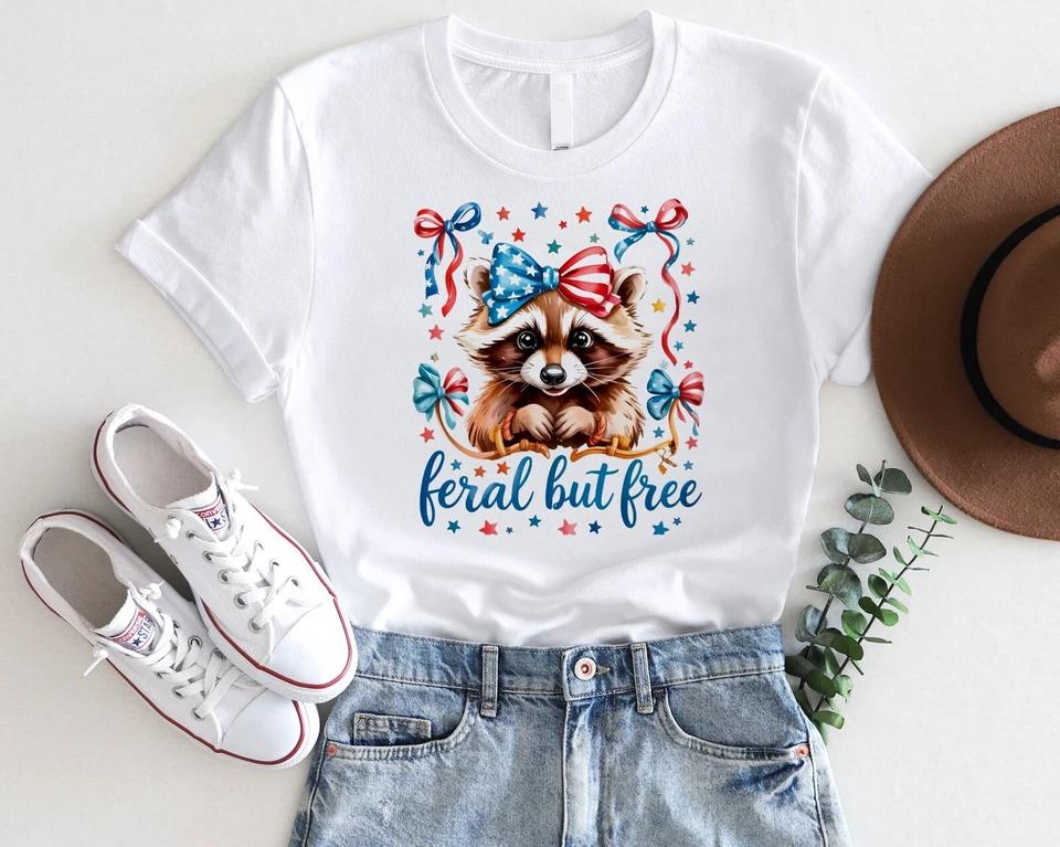 Feral But Free Raccoon T-Shirt – Funny 4th of July USA Animal Tee Feral But Free Raccoon T-Shirt – Funny 4th of July USA Animal Tee