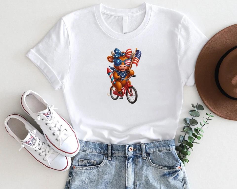 Patriotic Cow on Bike Shirt – 4th of July Cute Cow Graphic Tee Patriotic Cow on Bike Shirt – 4th of July Cute Cow Graphic Tee